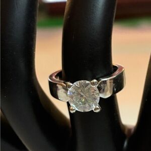 Round Cut Cubic Zirconia Solitaire in a Silver Tone Prong Setting Lot 57